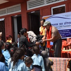 Donating educational materials for school child
